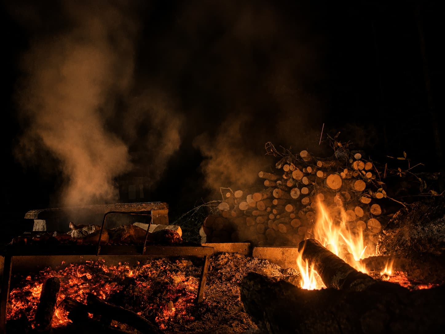 Embers rising from the evening bonfire
