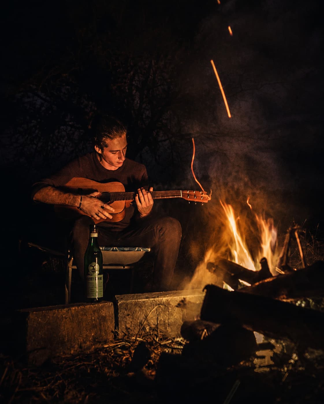 Guitar beside the fire during an Argentine ranch evening